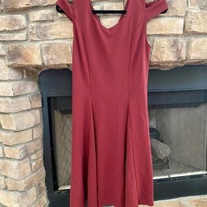 NWOT Thanth burgundy, cold shoulder cap sleeve w/ slightly pleated, flowy skirt.